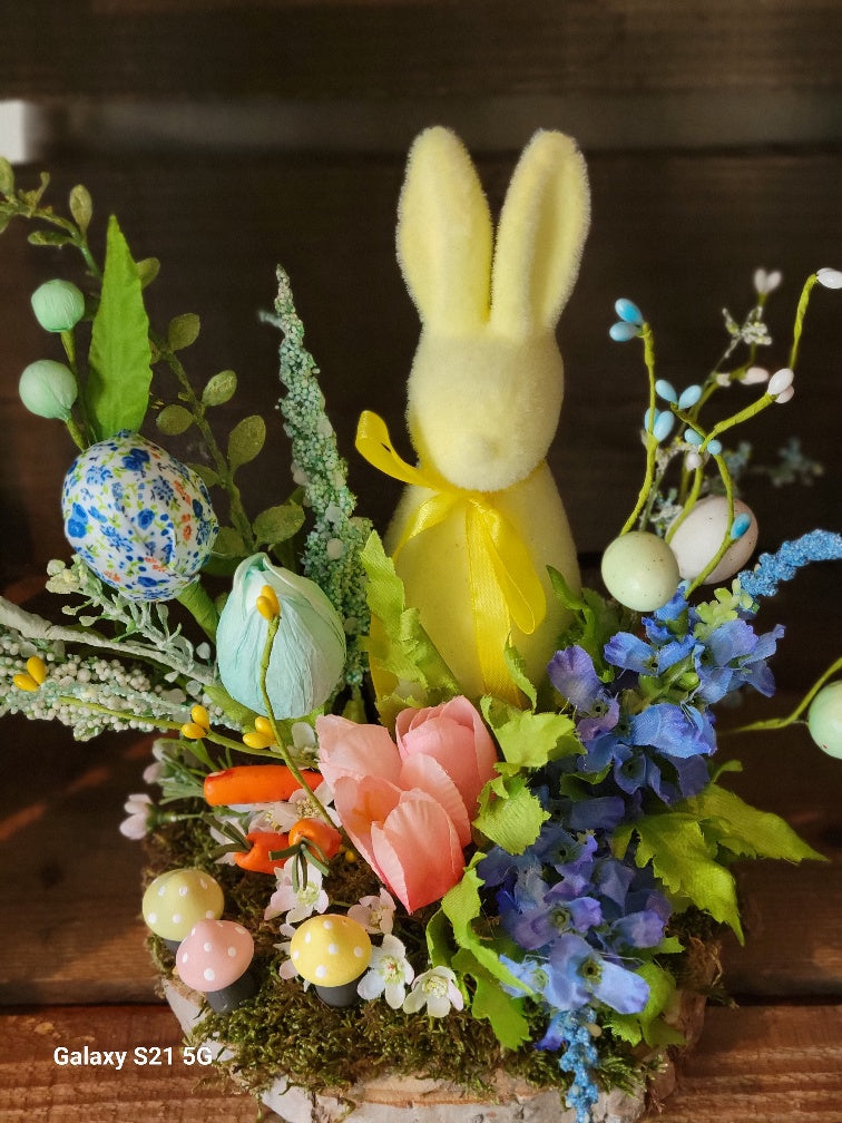 Yellow Easter Bunny on a wood base